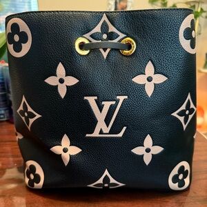 LV Black and Cream Clutch